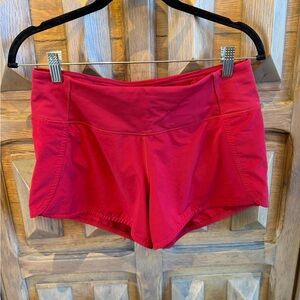 Lululemon speed up 4 inch Vibrant Red Garment shirt, size 6